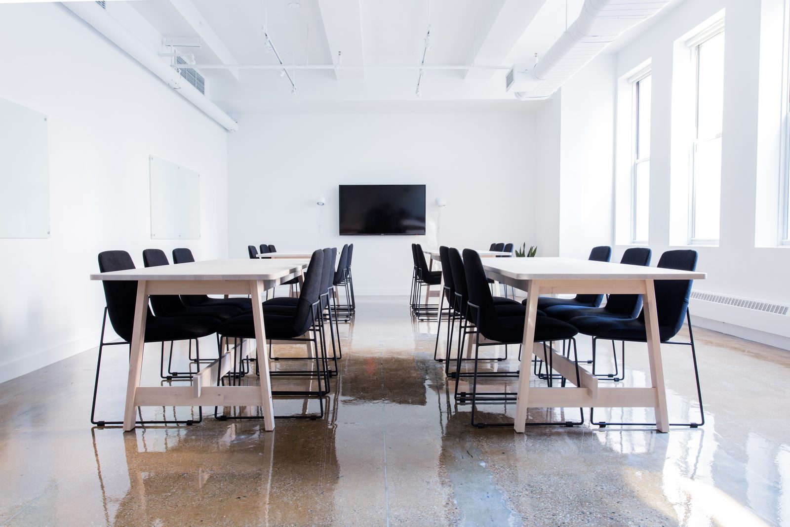 Bright, dust-free space with polished floors after post-construction cleaning in Toronto